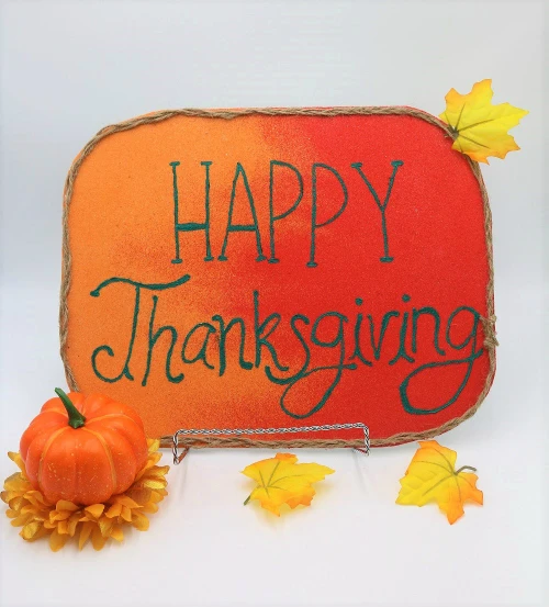 Use colored sand to create a sign to welcome guests to the Thanksgiving table this year!